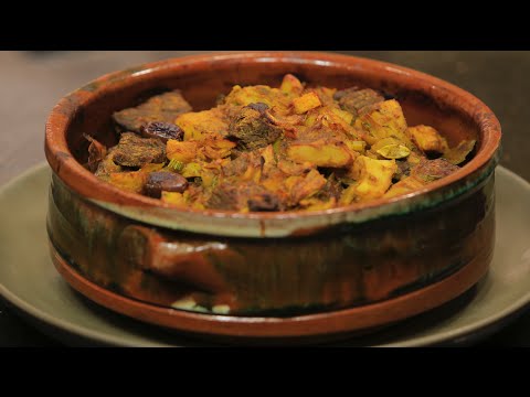 تعلمِ عمل طاجن بالزيتون والخرشوف