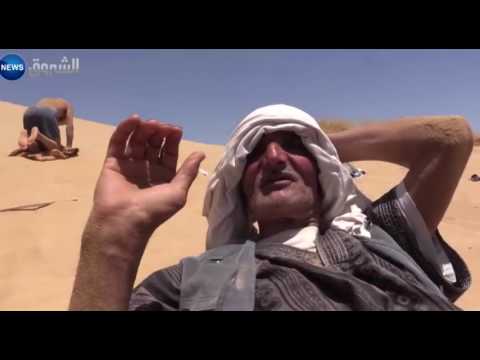 مرضى العظام والمفاصل يجدون ملاذهم في الردم تحت الرمال