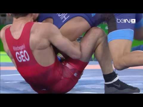 شاهد  الجورجي خينتشغاشفيلي يحرز ذهبية وزن 57 كلغ