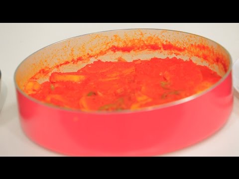 طريقة عمل صينية بطاطس بالطماطم والبصل