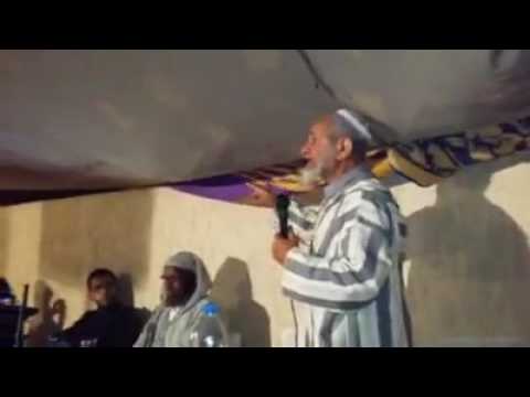 بالفيديو  شيخ مغربي يرد على مول البنذير