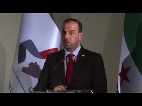 شاهد المعارضة السورية إلى جنيف يتمسك بتنحي الأسد