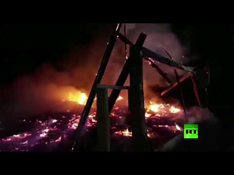 مجهولون يحرقون كنائس في تشيلي