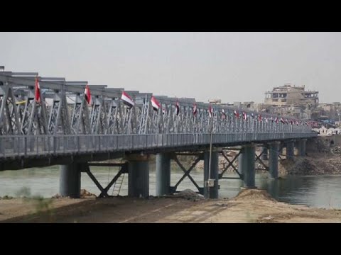 شاهد إعادة فتح الجسر القديم بالموصل
