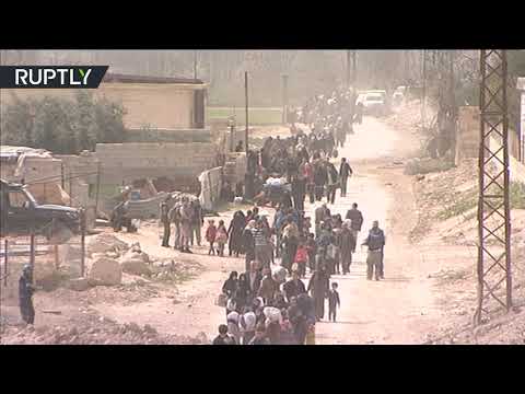 شاهد خروج آلاف المدنيين من الغوطة الشرقية عبر معبر حمورية