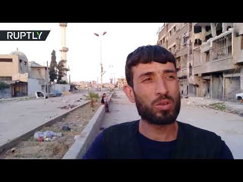 شاهد سكان دوما يرون ملاذهم في المسلحين