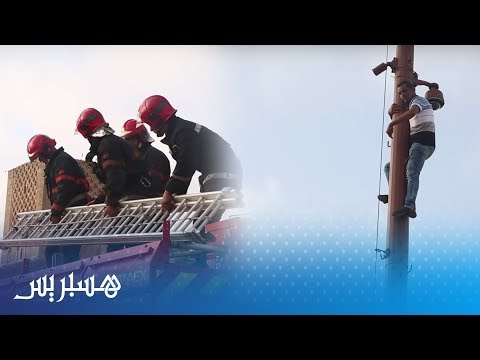 شاهدشخص يحاول الانتحار مجددًا من أعلى عمود في الرباط