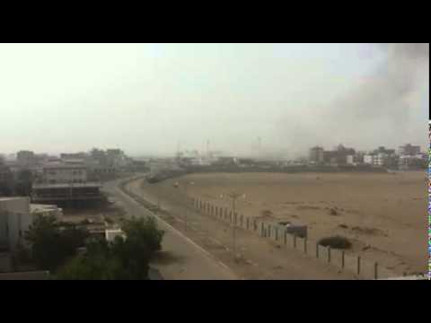 شاهد عاصفة الحزم تدمر مخازن سلاح في ملعب يمني