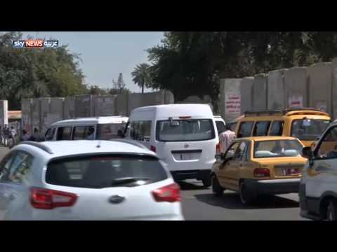 شاهد شوارع بغداد وصورللقادة الإيرانيين