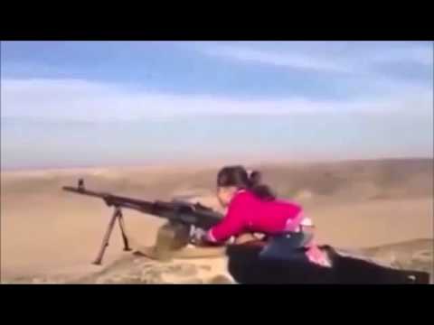 شاهد طفلة كردية تستخدم رشاش لمحاربة داعش