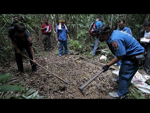 شاهد شبكات تهريب البشر في ماليزيا تستخدم 139 قبرًا و28 مخيَّمًا