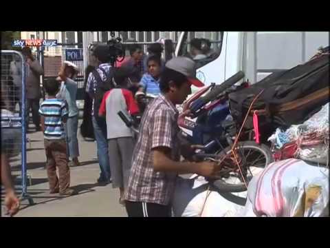 شاهد مئات اللاجئين يعودون إلى تل أبيض