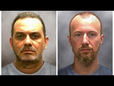 شاهد شرطة نيويورك تواصل البحث عن سجينين هاربين