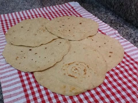 شاهد طريقة عمل الرغيف الشامي بدون فرن