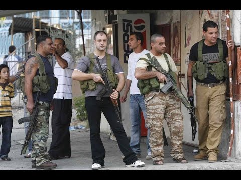 شاهد قوات حزب الله تقيم نقاط عسكرية بغطاء ديني