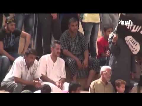 فيديو داعش يعدك الأسرى على يد الأطفال