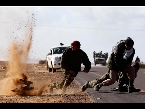 شاهد اشتباكات عنيفة في مدينة بنغازي الليبية