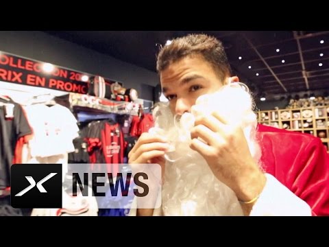 حاتم بن عرفة يرتدي ملابس بابا نويل لتهنئة المارة بالكريسماس