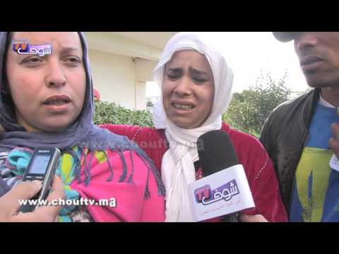 زوجة أحد العمال المفقودين تبكي زوجها