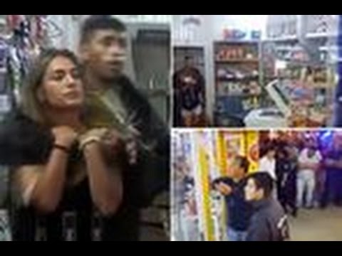 شاهد لص يحتجز فتاة رهينة للتفاوض مع رجال الشرطة