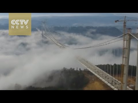 شاهد بدء تشغيل أعلى وأطول كوبري يمر فوق السحاب في آسيا