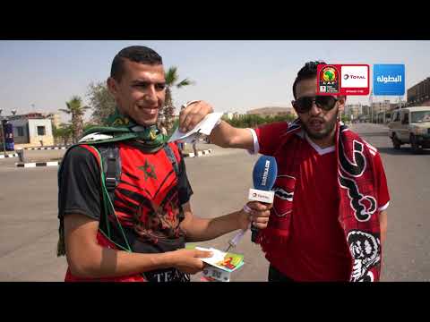 شاهد مشجعان للوداد والكاك يقطعان آلاف الأميال لمساندة المنتخب المغربي في الكان
